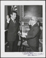 Begun being sworn in with Mayor Abraham Beame 